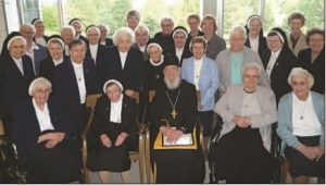 Gathered for a photo at the Sisters of St. Basil Monastery dining hall, members of the Sisters of St. Basil, the Byzantine Benedictine Sisters, and Holy Trinity Monastery were recognized May 22 by the Byzantine Serra Club, which celebrated a day of recognition and thanks in their honor.